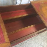 Coffee table with storage for bottles and glasses in oak.
