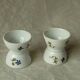 Diabolo porcelain egg cup with barbell decoration