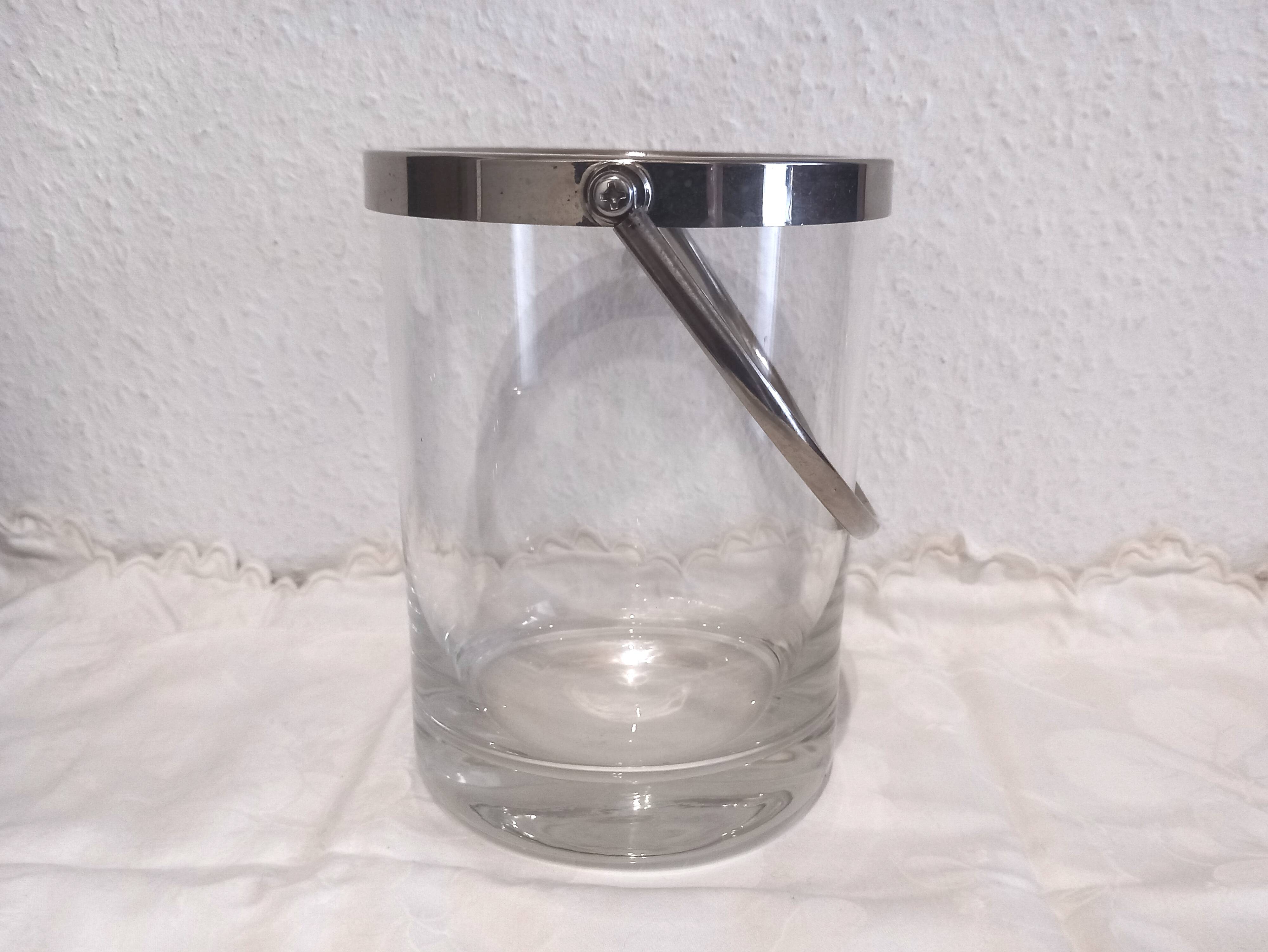 Glass and silver metal ice bucket