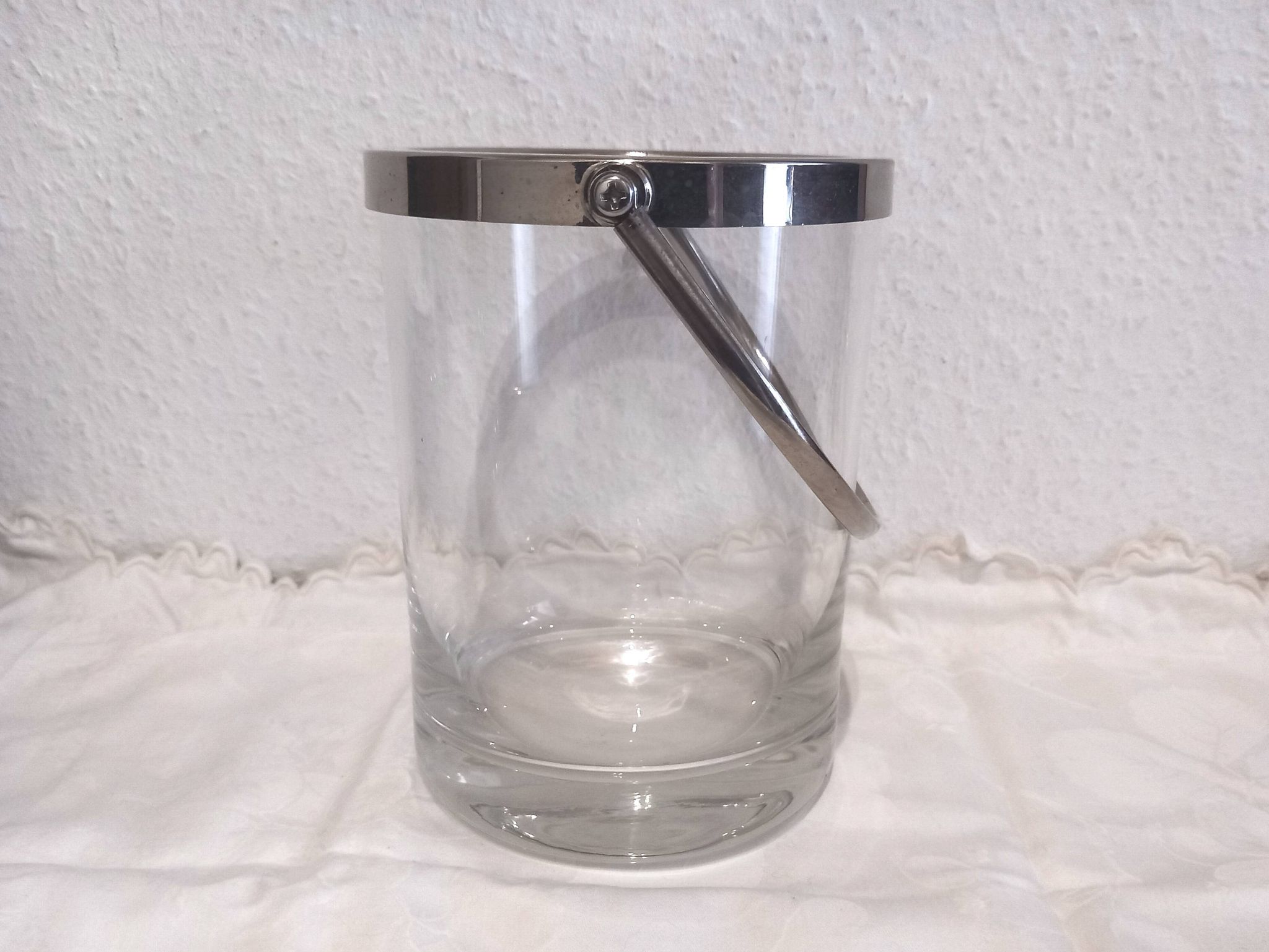 Glass and silver metal ice bucket