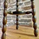 High stool in beaded wood - spool legs