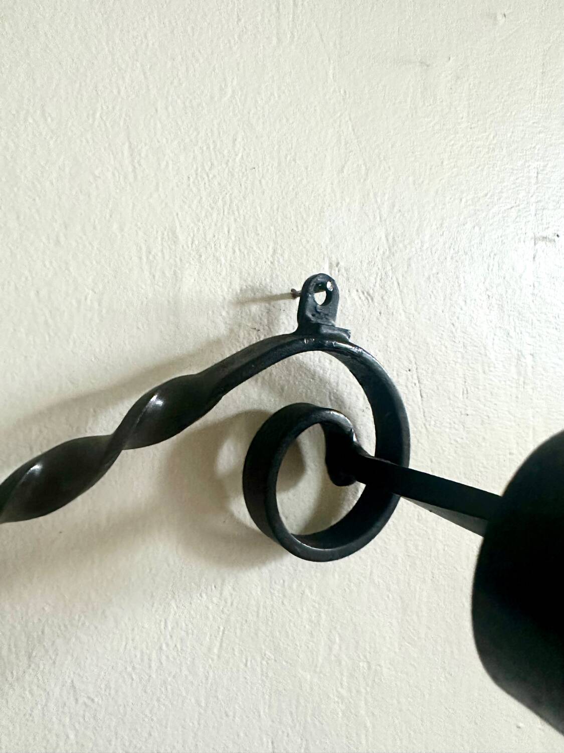 Old wrought iron coat rack