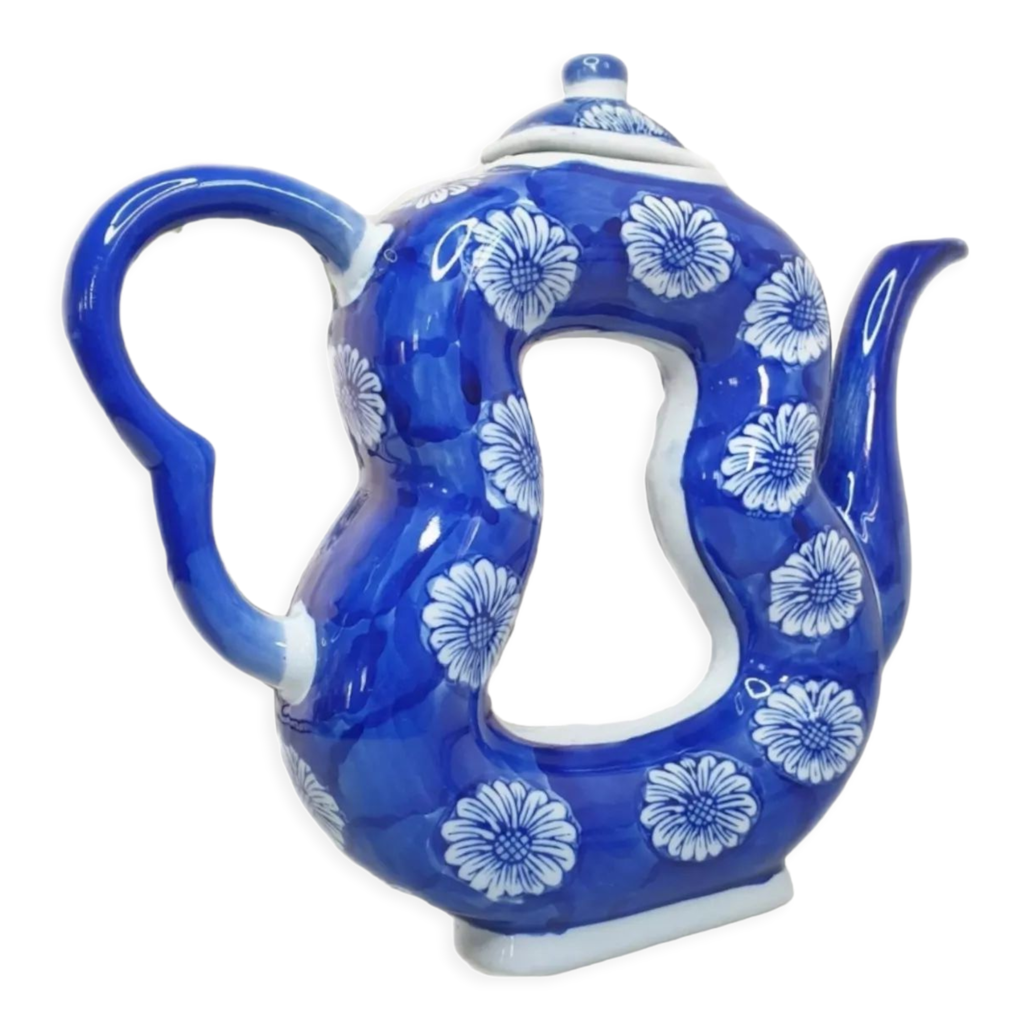 Old Asian teapot in toroidal shape in blue porcelain with floral decoration 20th century