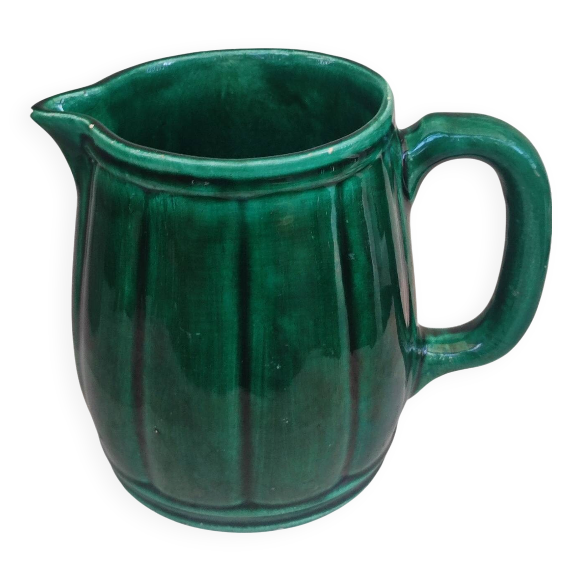 Old green jug