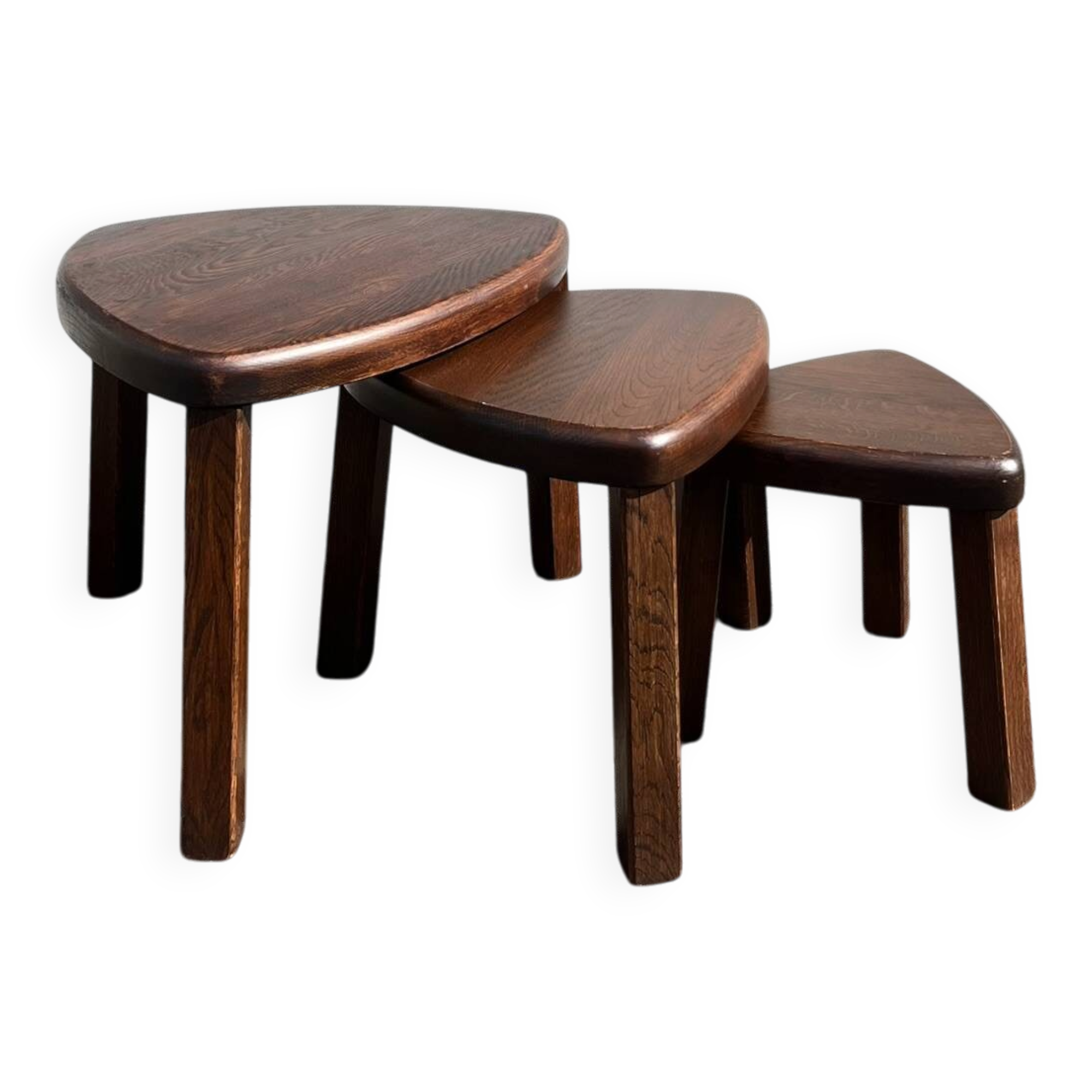 Nested tripod tables made of solid wood, in a modernist brutalist style.