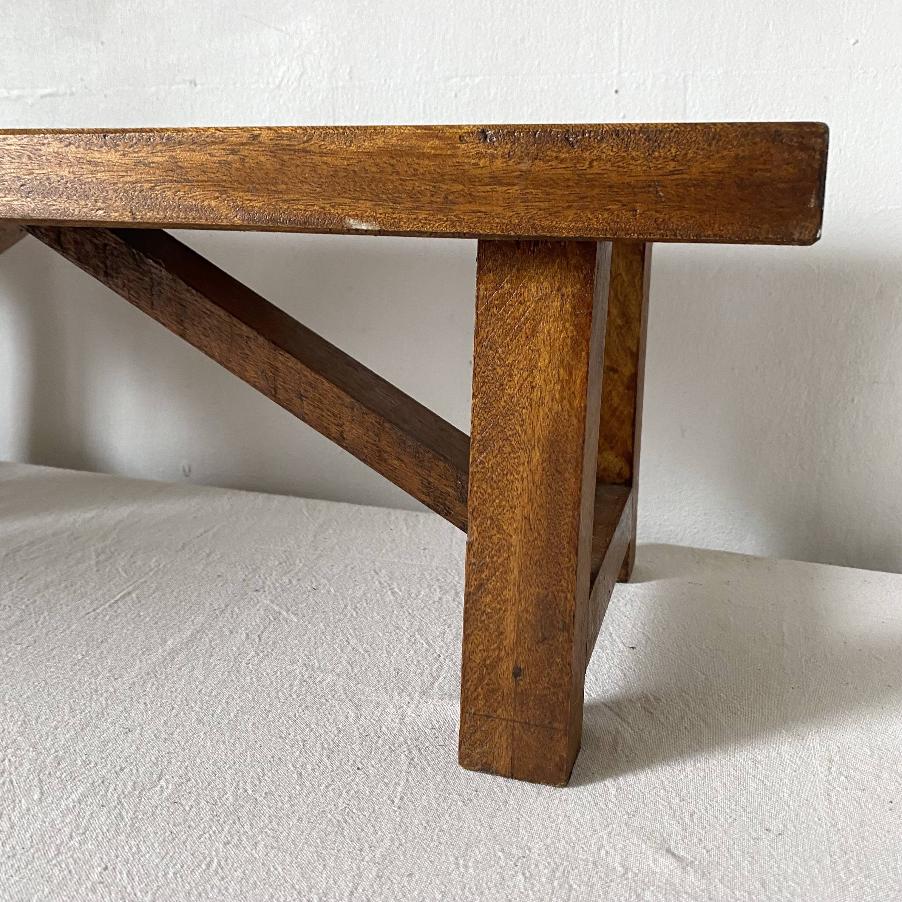 Low stool in varnished wood