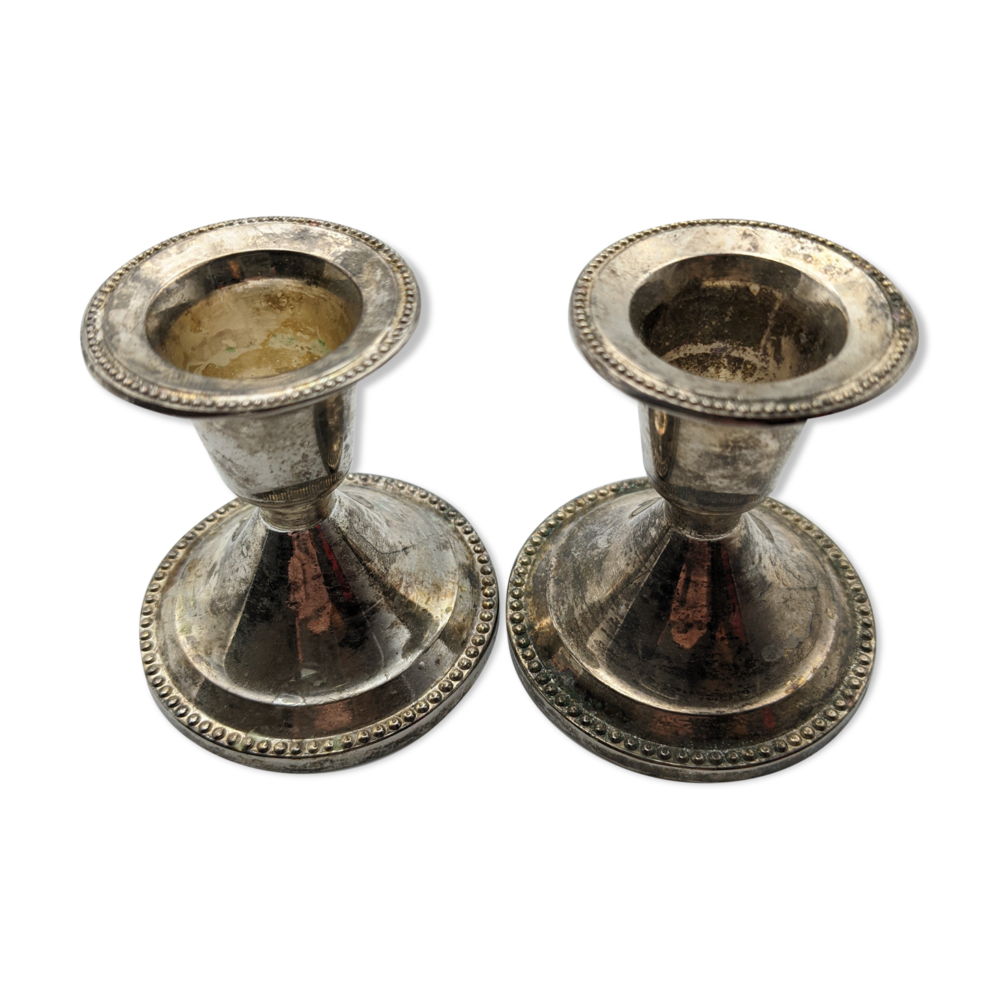 Pair of silver metal candlesticks