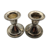 Pair of silver metal candlesticks