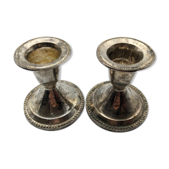 Pair of silver metal candlesticks
