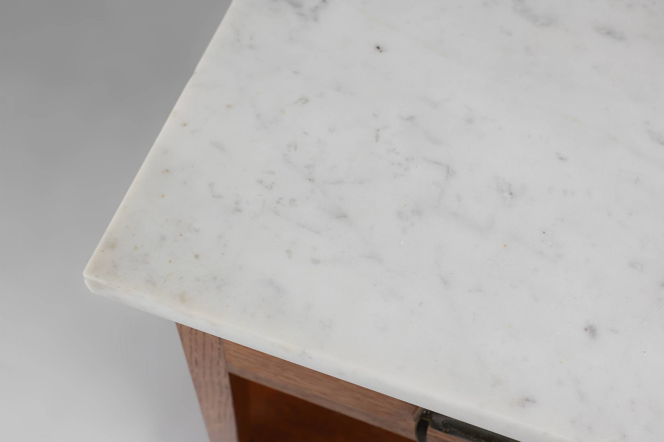 French Art Deco bedside table with a Carrara marble top, circa 1920.