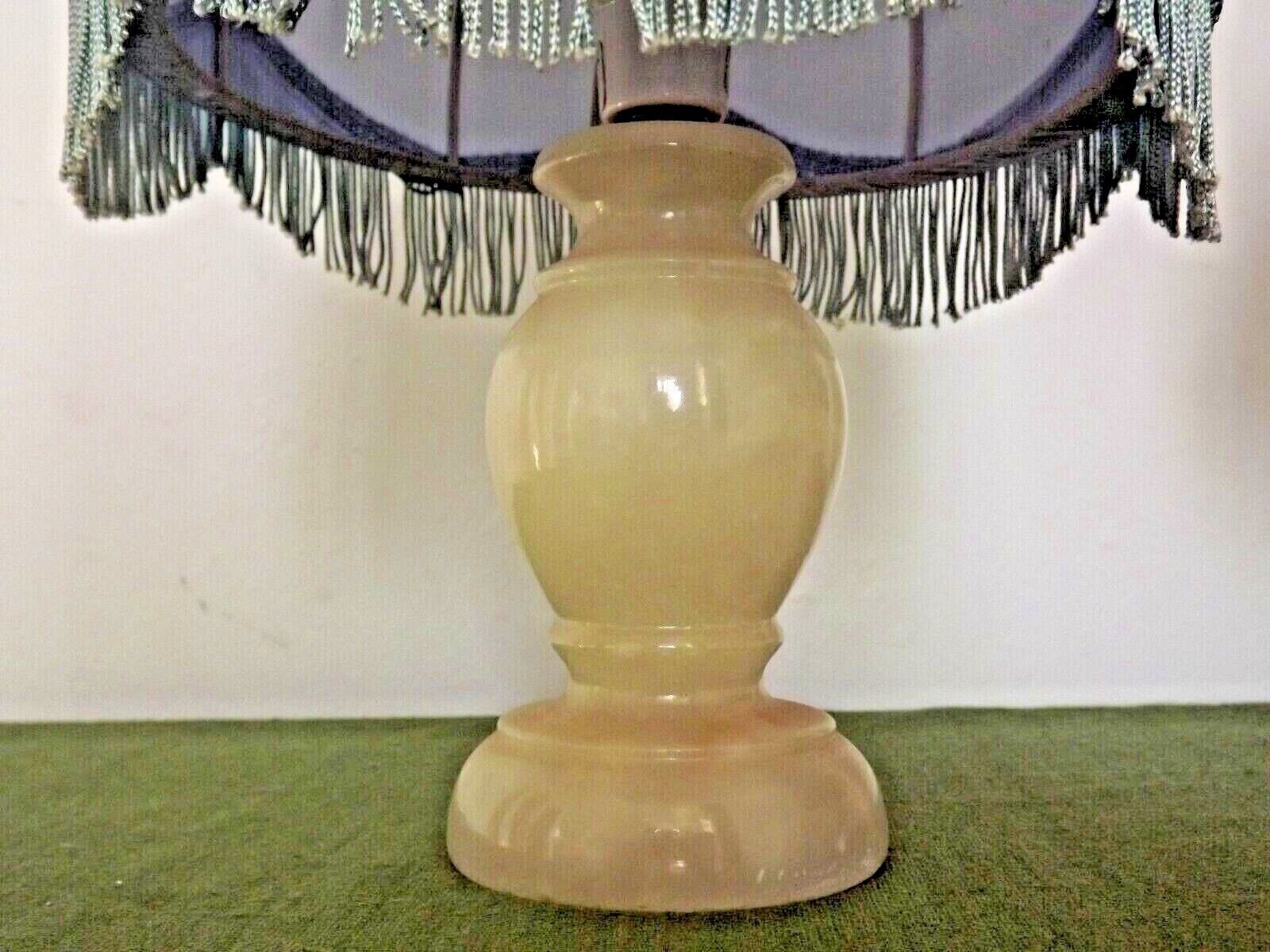 Pair of marble bedside lamps with blue satin fringed shades