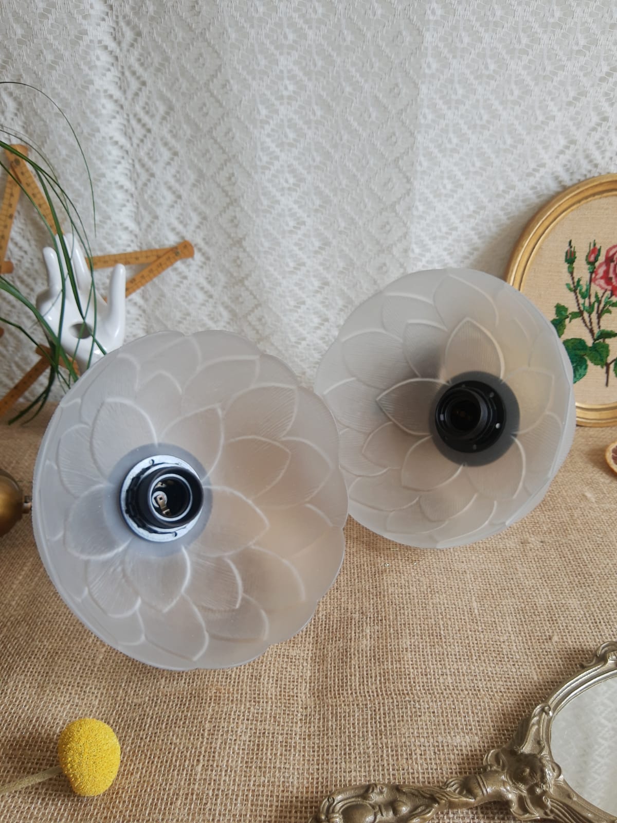 Pair of frosted glass flower pendant lights with vintage wood and brass