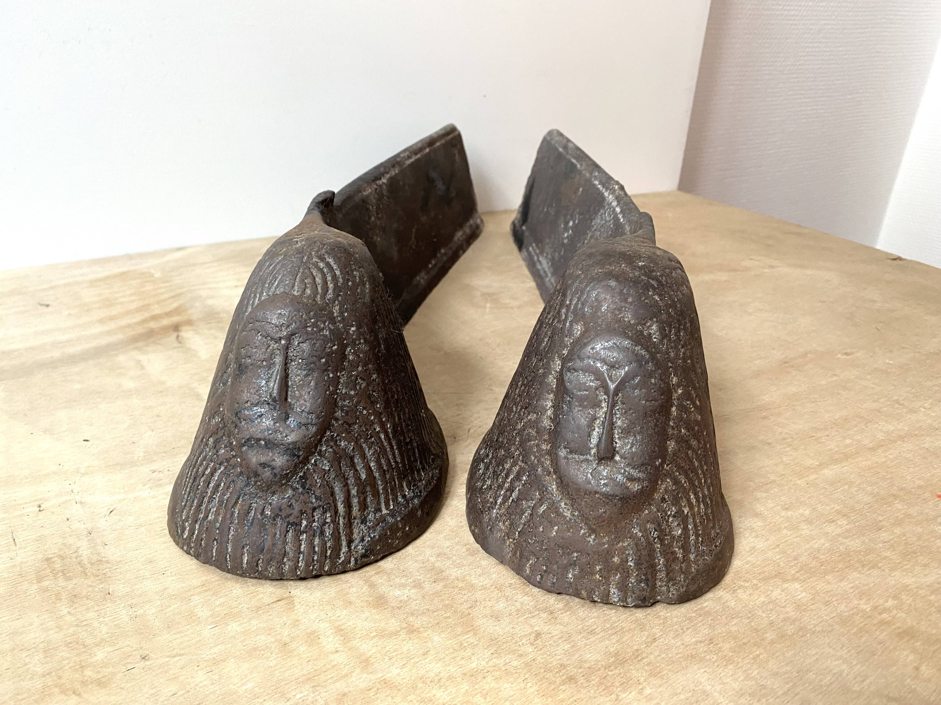 Pair of modernist anthropomorphic fireplace andirons, brutalist log holders 1950s