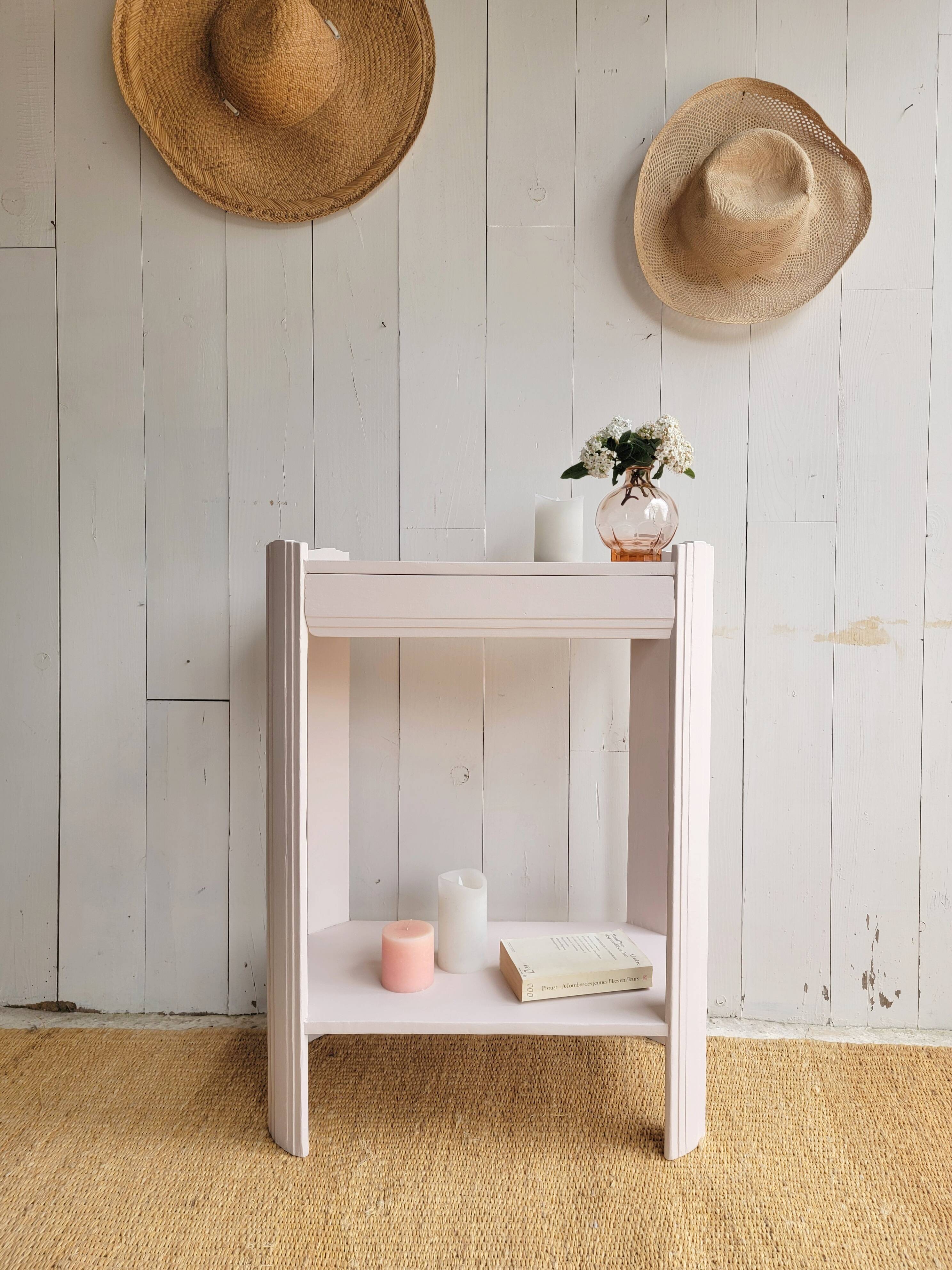 Small renovated Art Deco console in nude colour.