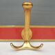 Vintage bistro coat rack with 3 patères gold and red hooks