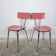 Pair of red Formica chairs with chrome legs