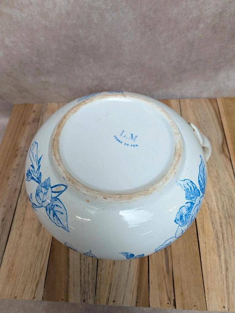 Small antique ironstone jug L.m Creil and Montereau with blue floral decoration.