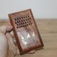 Vintage folding cigarette case in carved wood – golden floral decoration – oriental style