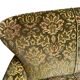 Vintage baroque chair with a rich floral pattern