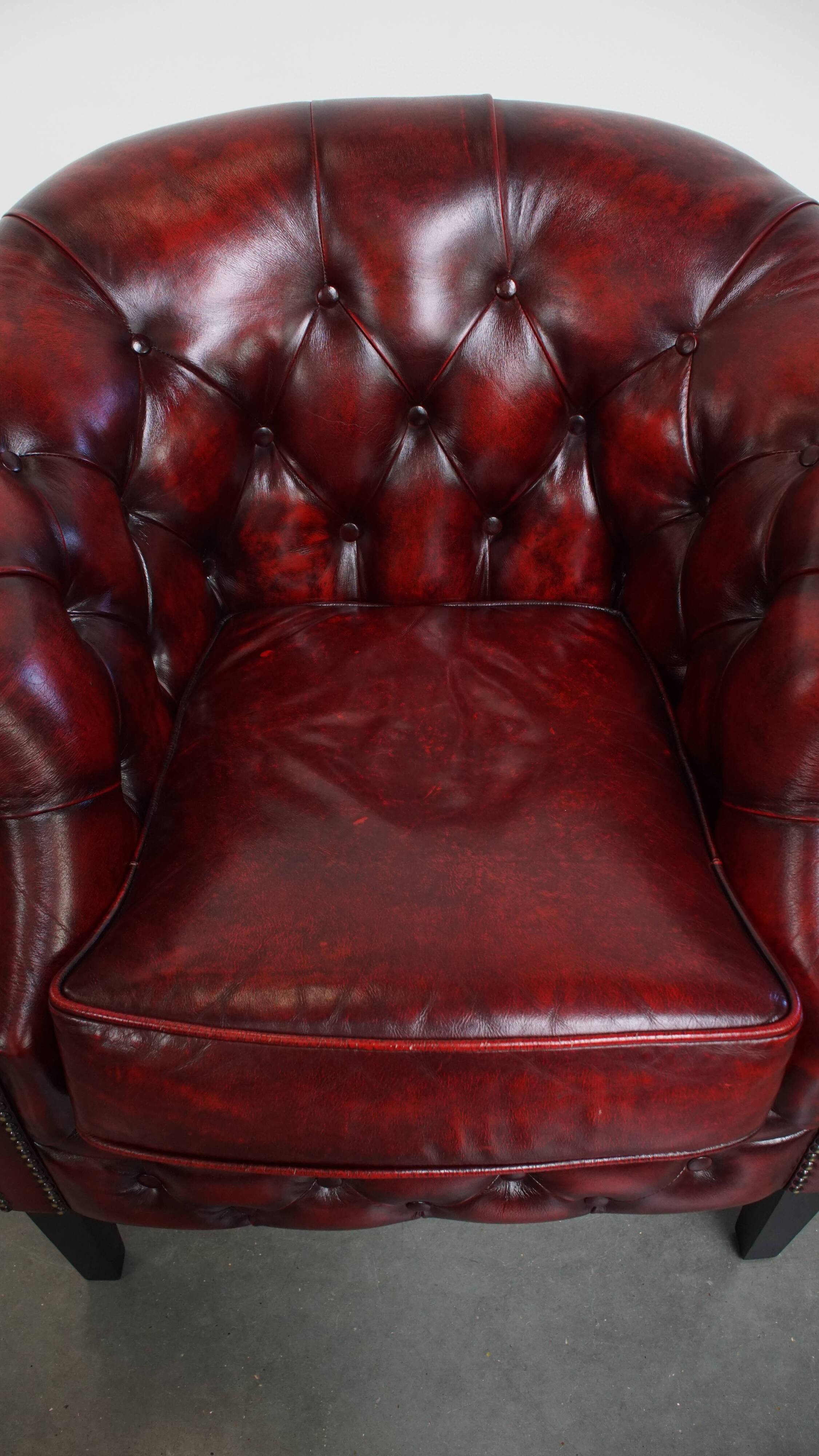 Set of a Red Cowhide Leather Chesterfield Club Chair and Side Table