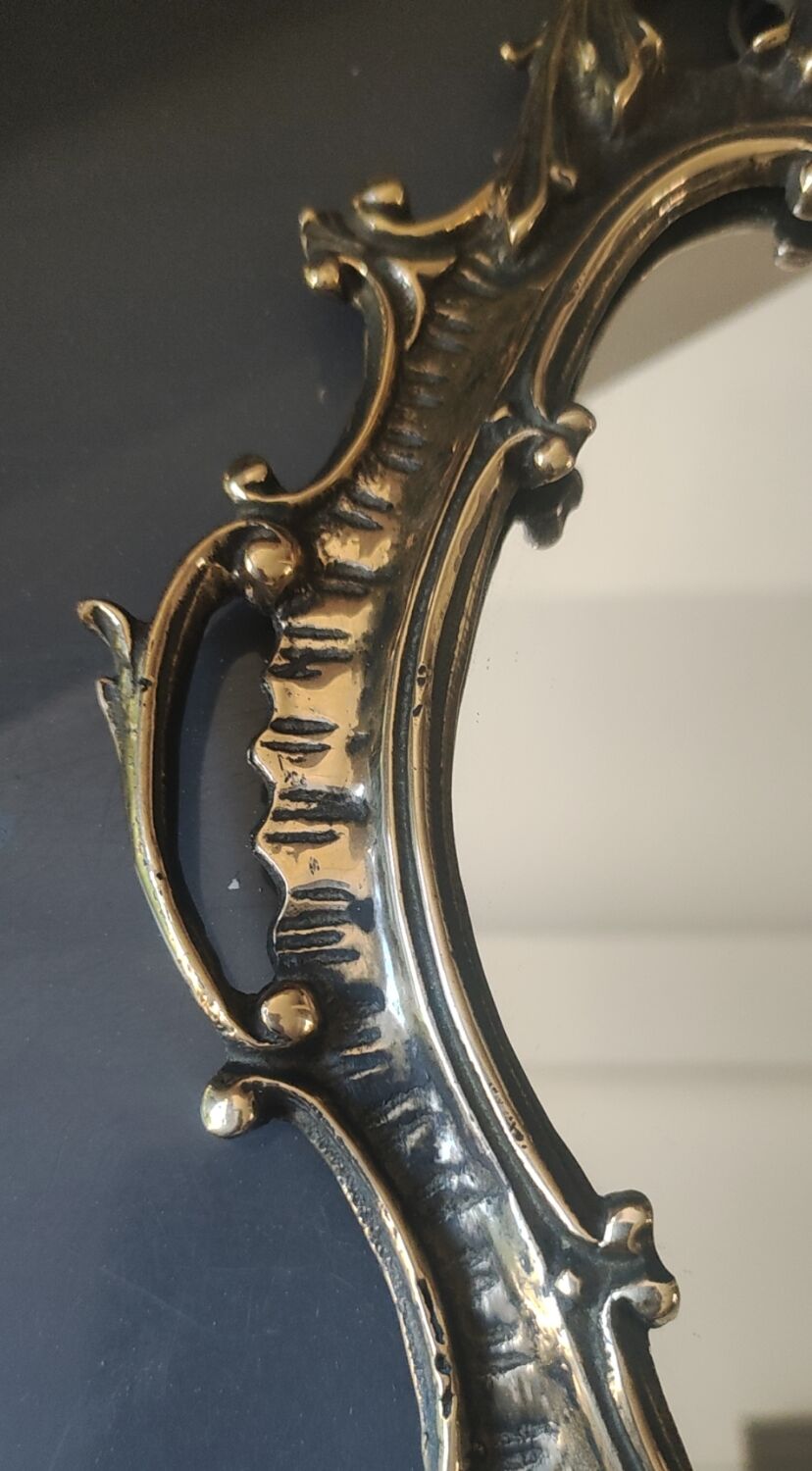 Antique gilded bronze wall mirror. Rococo/Baroque style. Dimensions 31x17cm.