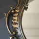 Antique gilded bronze wall mirror. Rococo/Baroque style. Dimensions 31x17cm.