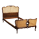 Simple bed in Barocchetto style in walnut.