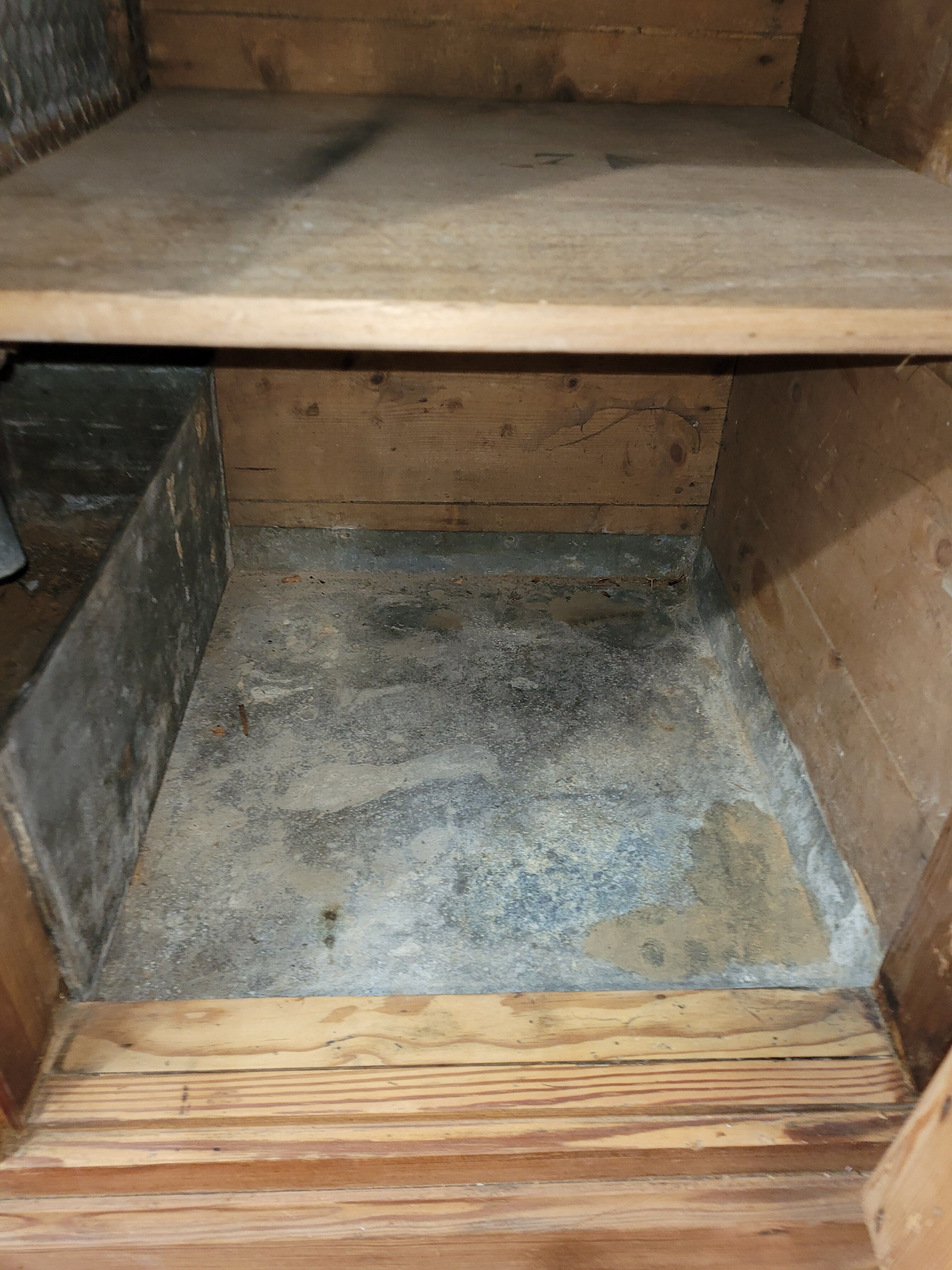 Antique cooler with a door