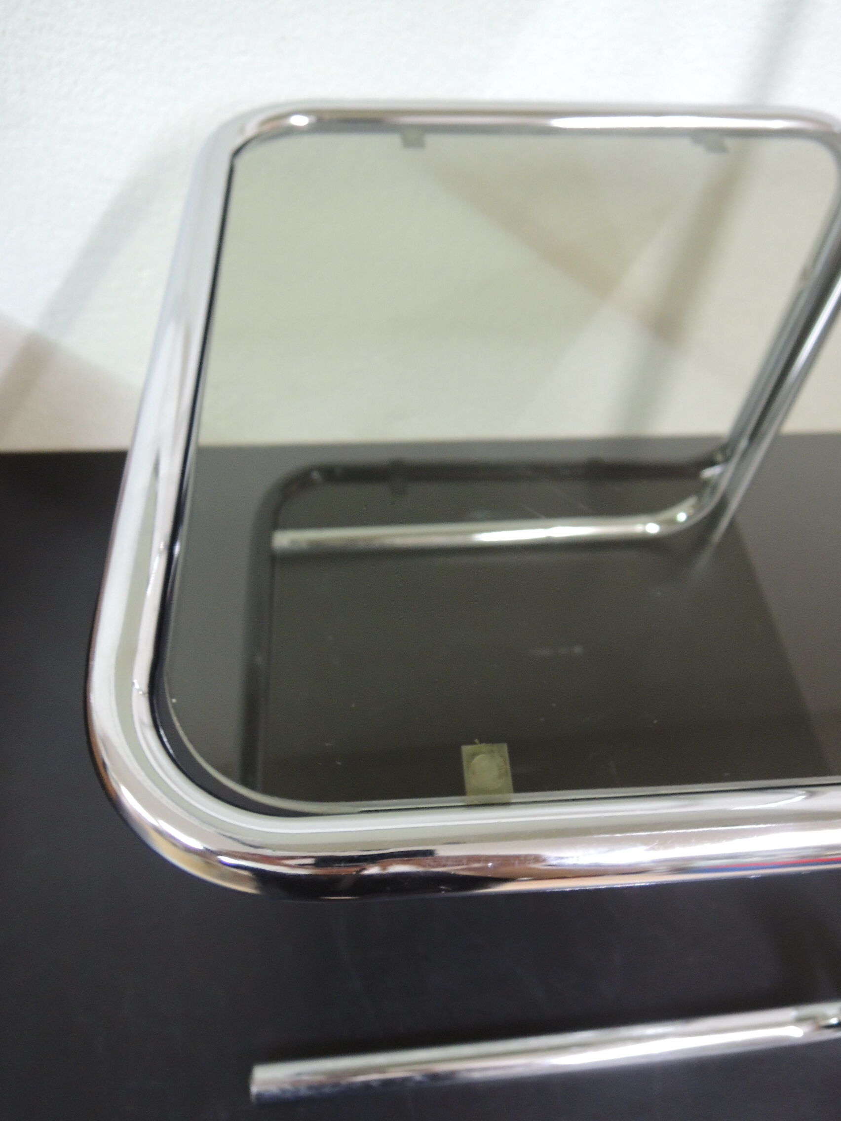 Side table in chrome and glass