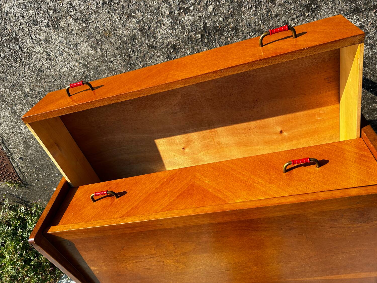 Vintage chest of drawers with compass feet.