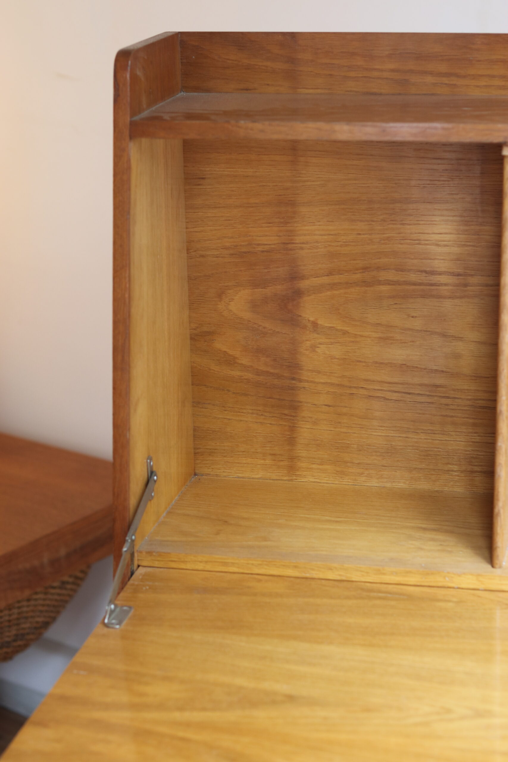 Vintage 1960s secretary in oak veneer with a drop-down front.
