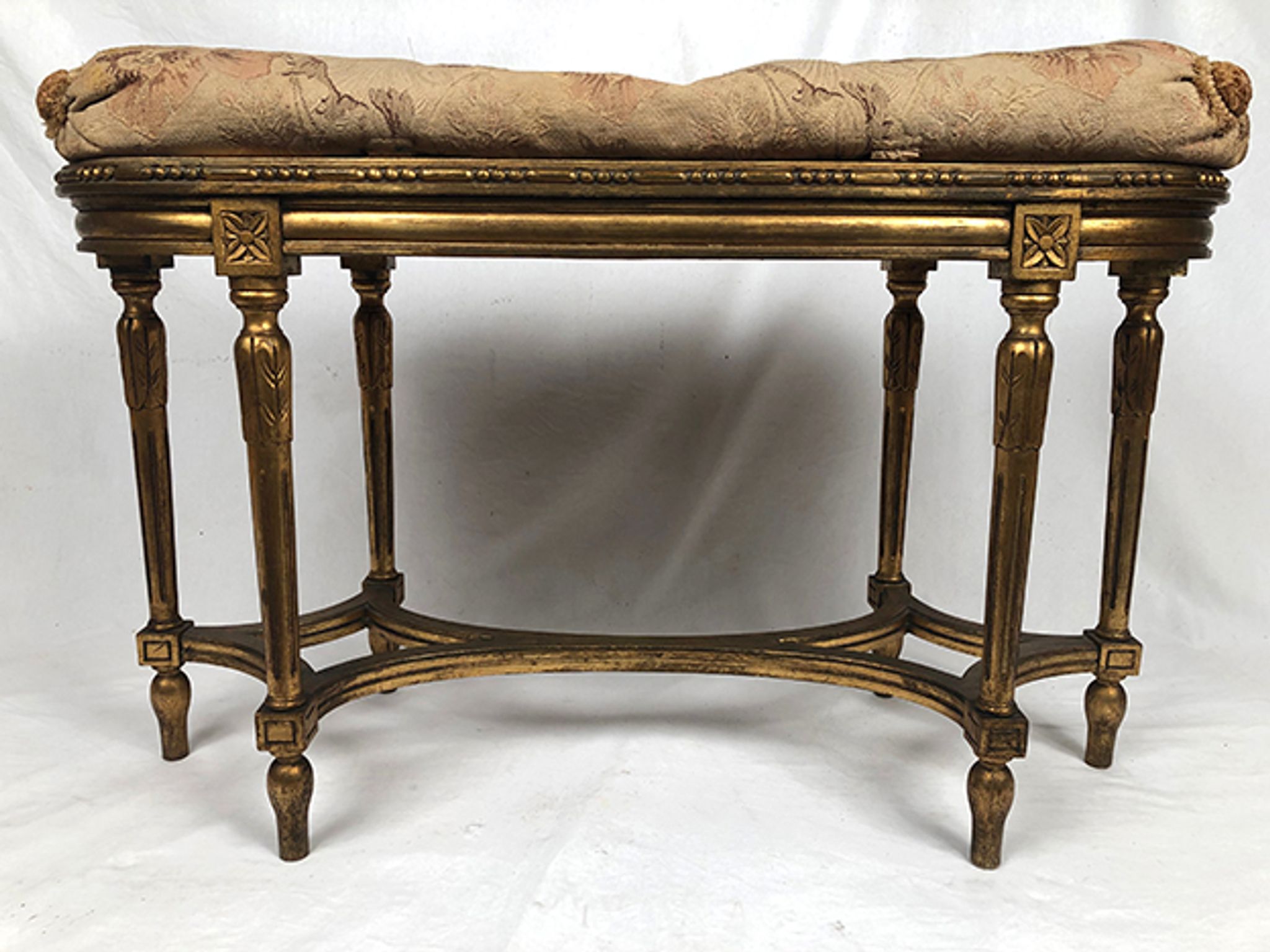 Banquette de piano de style Louis XVI bois doré foncé de canne