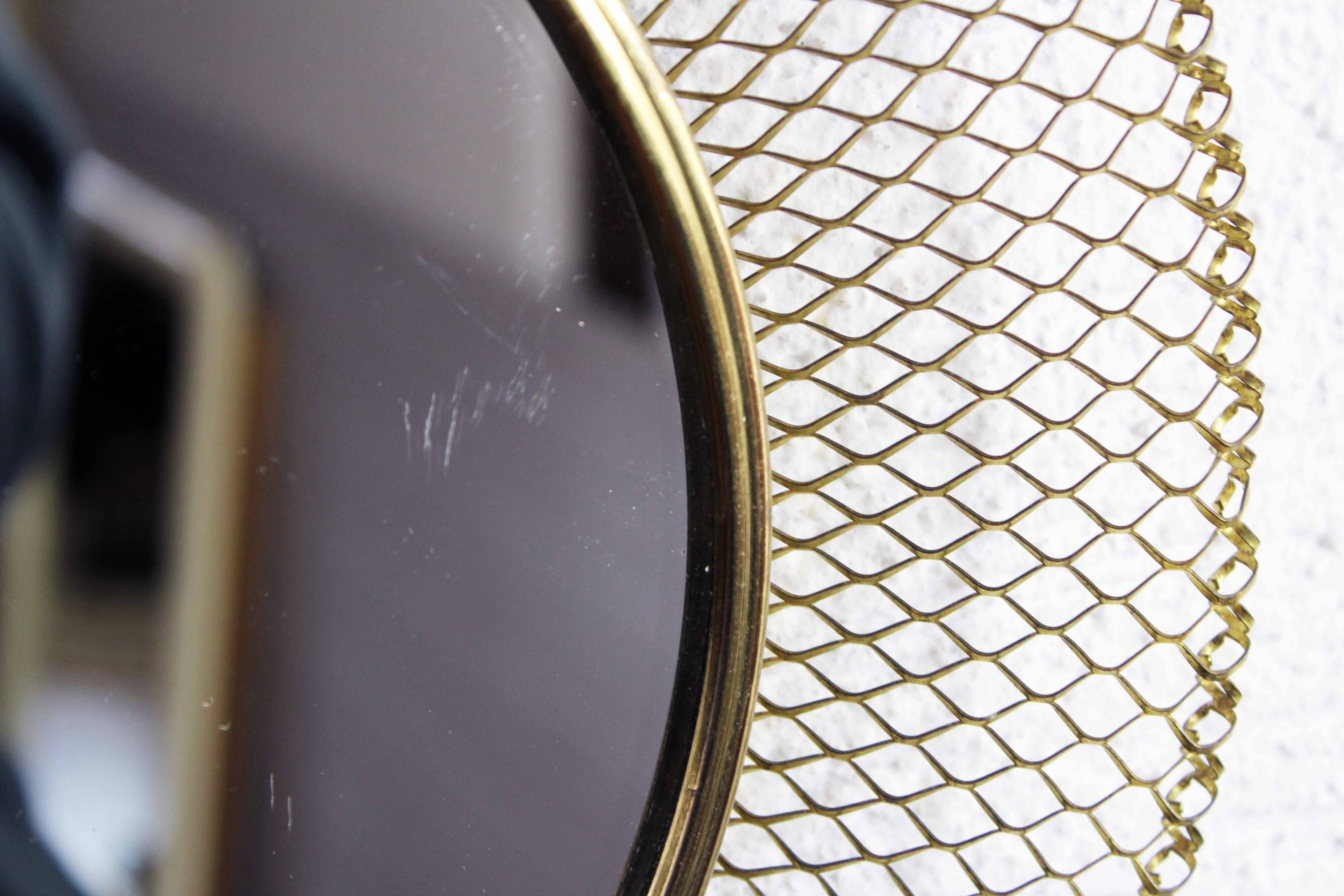 Round gold metal mirror