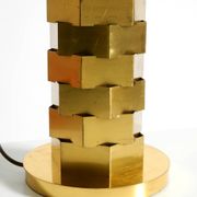 1960s brass table lamp by Vereinigte Werkstätten with an illuminated base