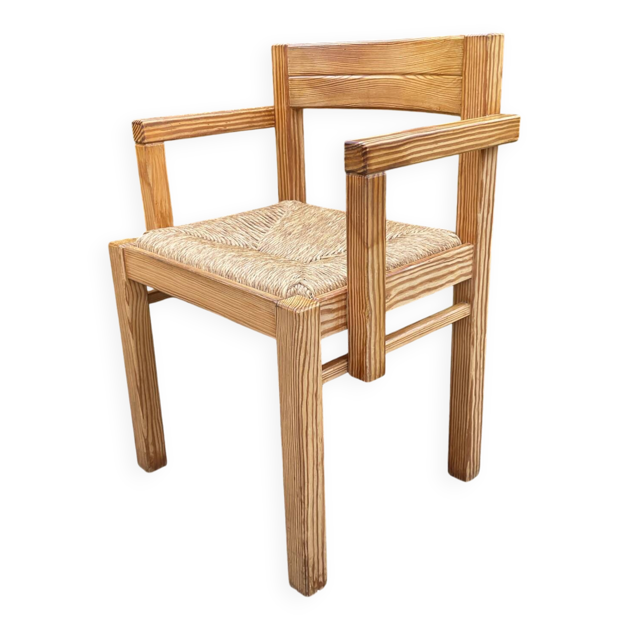Brutalist chair in solid pine with a straw seat from the 1970s.