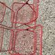 Set of 5 vintage red metal mesh folding chairs, Ted Net style.