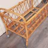 rattan cradle on roulette, missing fleche