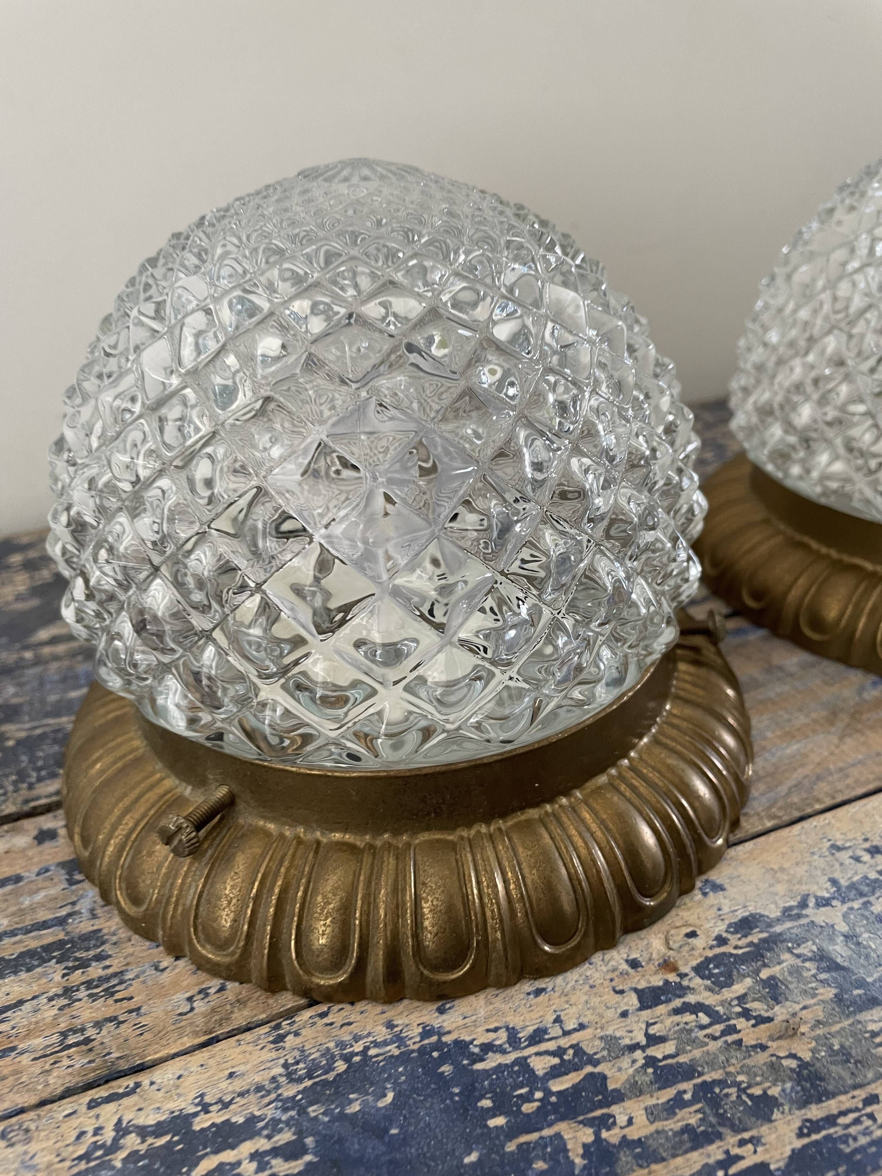 Set of two ceiling lamps or sconces in brass and glass