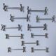 Eleven 70s design metal "crosshair" knife holders