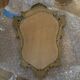 Antique mirror in Louis XV Rocaille style with carved frame.