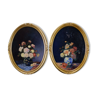 Pair of still life paintings bouquets oval golden frame