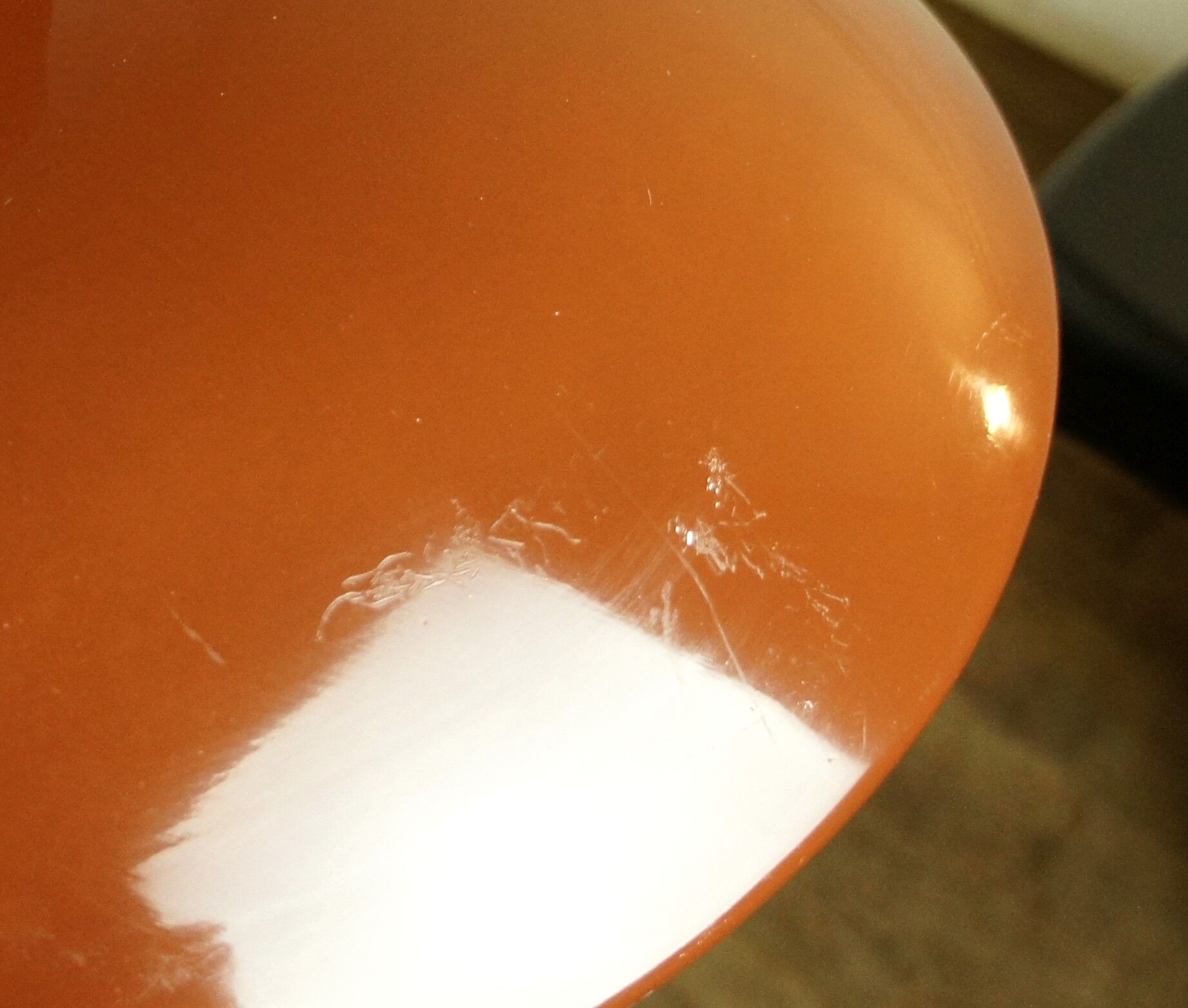 UFO chocolate lacquered metal hanging