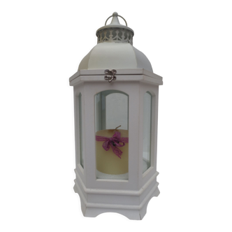 White lantern with candle, wood and windows, hexagonal shape