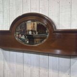 English mahogany shelf with its bevelled mirror from the early 20th century.