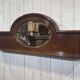 English mahogany shelf with its bevelled mirror from the early 20th century.