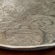 Silvered metal table mat