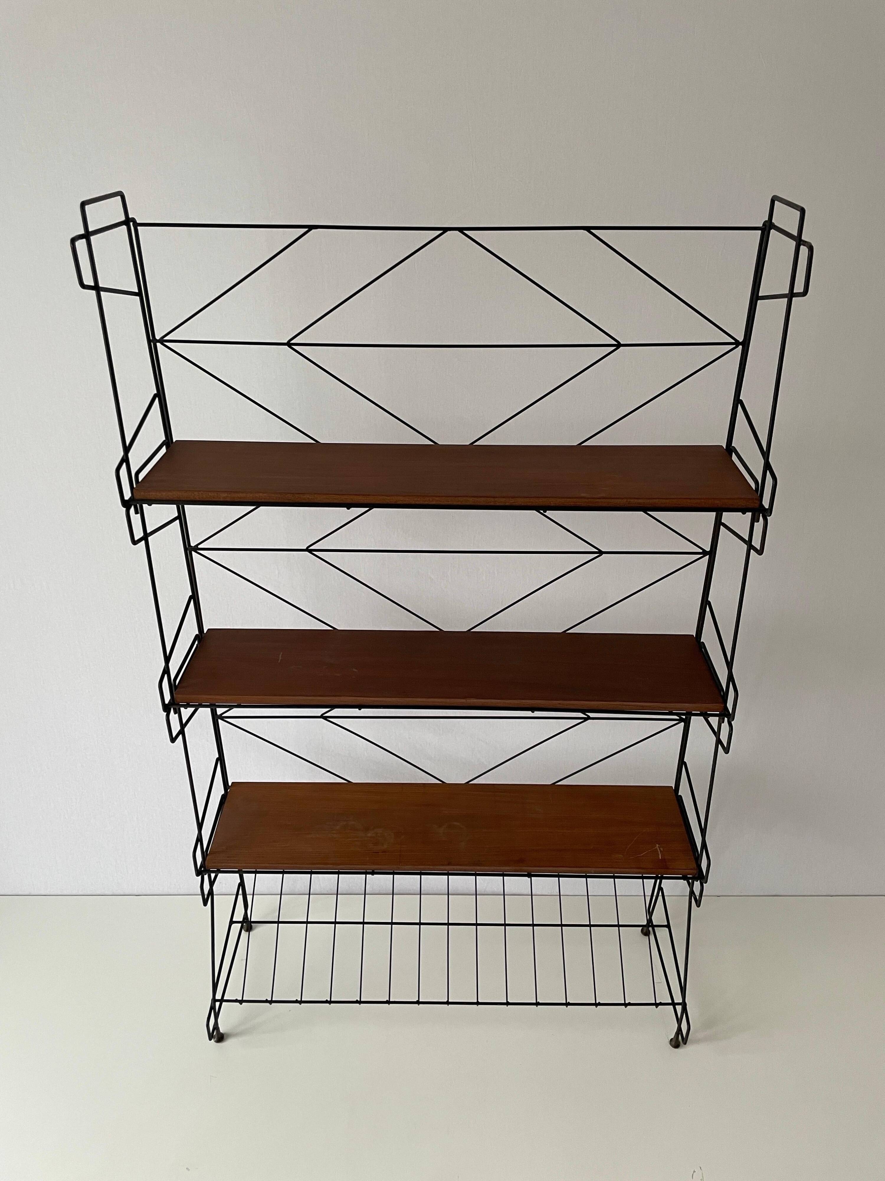 Free-standing shelf with a metal structure and 3 shelves, 1960s, Italy.