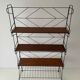 Free-standing shelf with a metal structure and 3 shelves, 1960s, Italy.