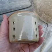 Vintage cheese draining pot in antique stoneware
