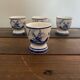 Set of 4 antique delft egg cups, white ceramic with blue vinta decor